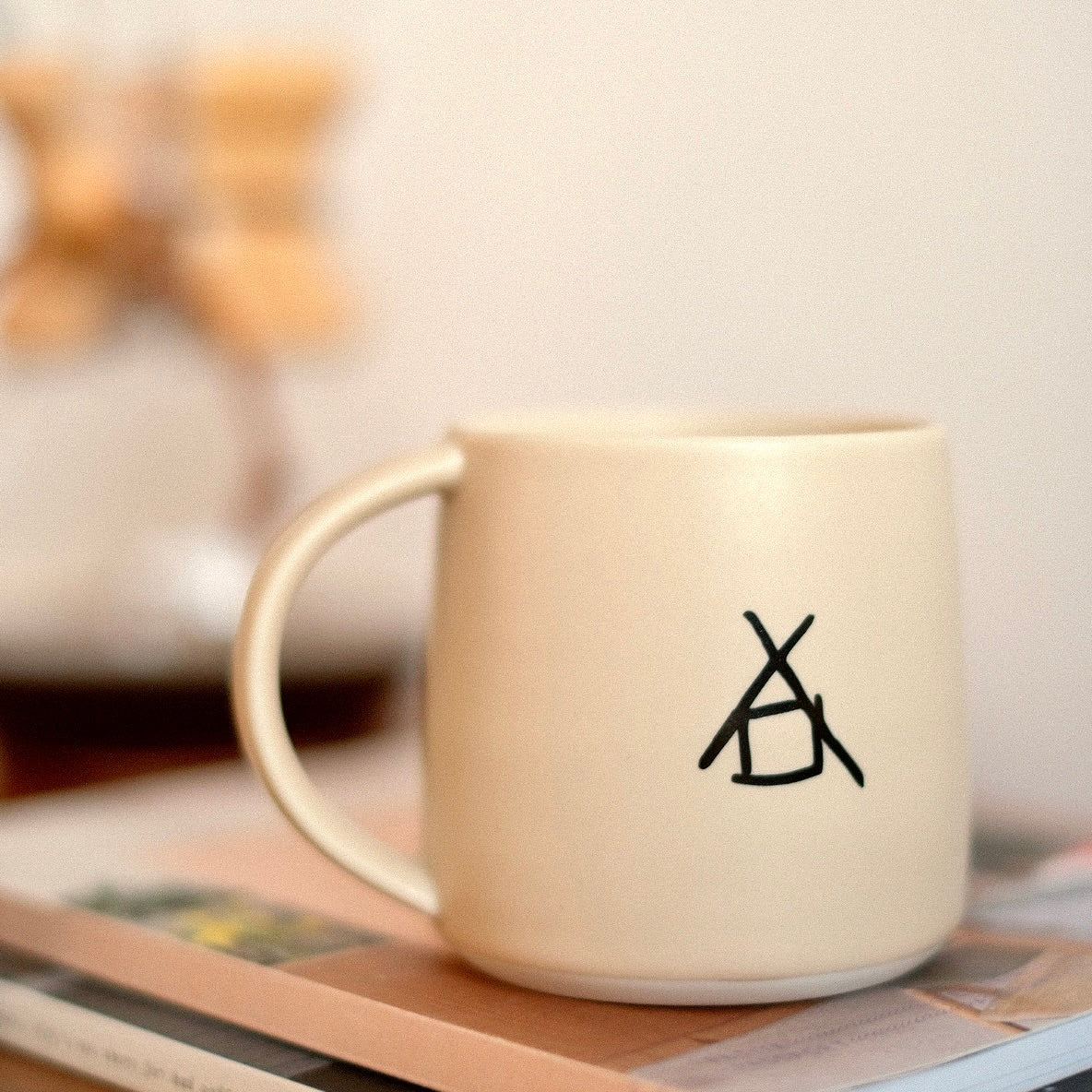 THE BARN sandstone mug with logo.