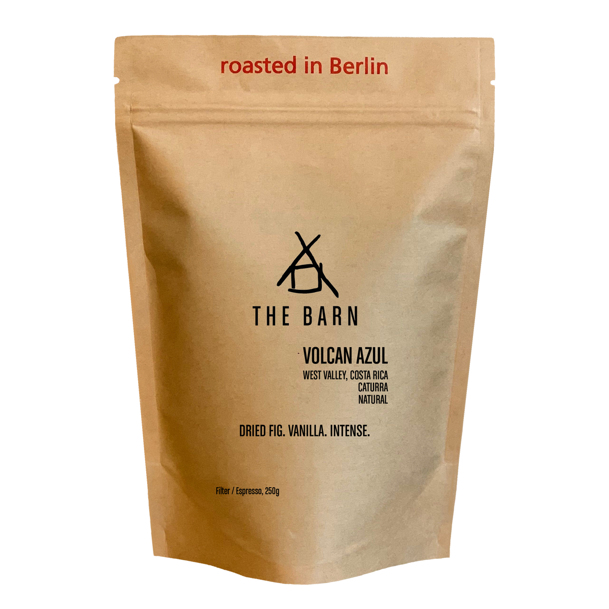 Kraft paper coffee bag with 'The Barn' branding and coffee description "Volcan Azul" on a white background