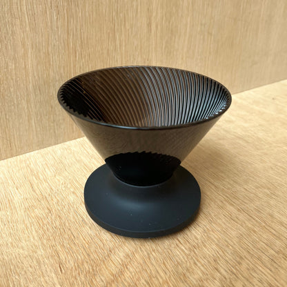 HARIO V60 NEO black dripper on wooden surface for precision coffee brewing