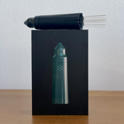NUCLEUS BLOOM coffee preparation tool and packaging showing dual-needle system for even extraction.