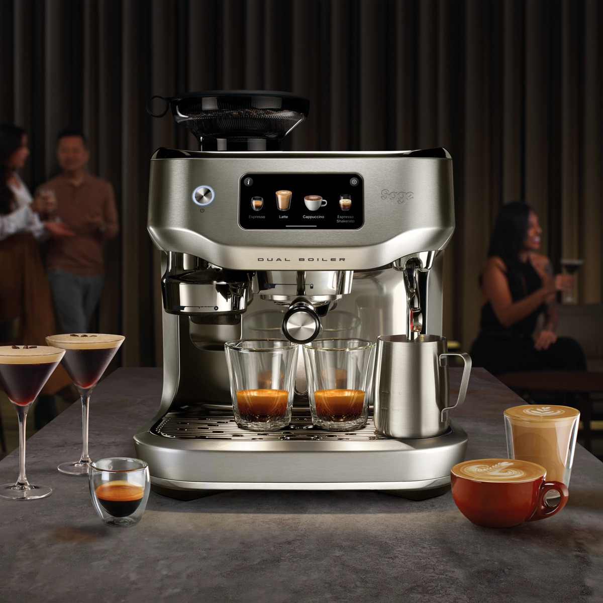 SAGE ORACLE DUAL BOILER espresso machine with dual boiler system and freshly brewed coffee shots displayed.