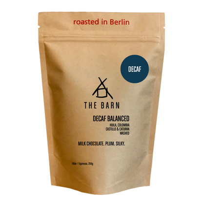 DECAF BALANCED coffee bag featuring a clean Colombian cup profile with notes of milk chocolate and plum.